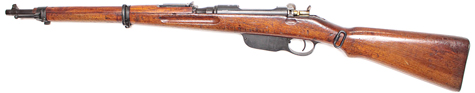 An object with a strap with Springfield Armory in the background