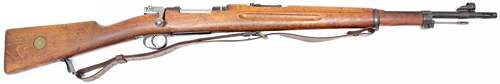 An object with a strap with Springfield Armory in the background