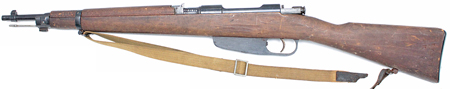 An object with a strap with Springfield Armory in the background