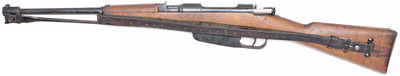 An object with a strap with Springfield Armory in the background